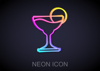 Glowing neon line Margarita cocktail glass with lime icon isolated on black background. Vector
