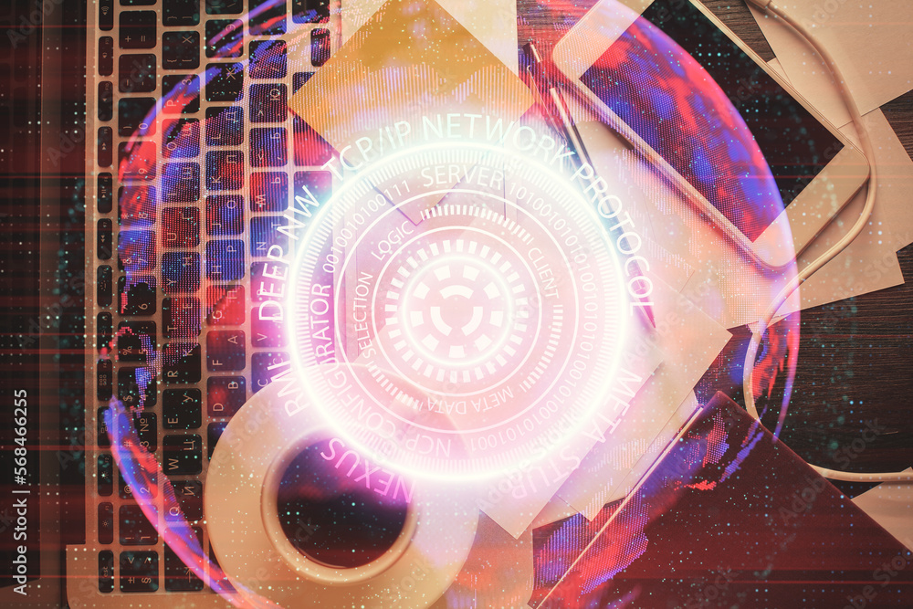 Poster Technology hologram drawing over computer on the desktop background. Top view. Double exposure. Tech concept.