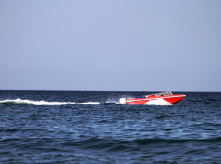 Red power boat