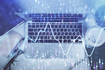 Multi exposure of financial chart drawing over table background with computer. Concept of research. Top view.