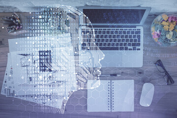 Double exposure of brain drawing hologram over topview work table background with computer. Concept of big data.