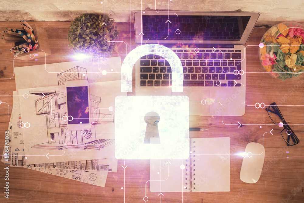 Poster Double exposure of lock hologram drawing over study table background with computer. Concept of data security. Top view.
