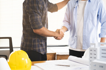 Success deal, Meeting and greeting for project of partner. Construction engineering, architect worker team or partnership hands shaking, handshake after agreement in office site, collaboration concept
