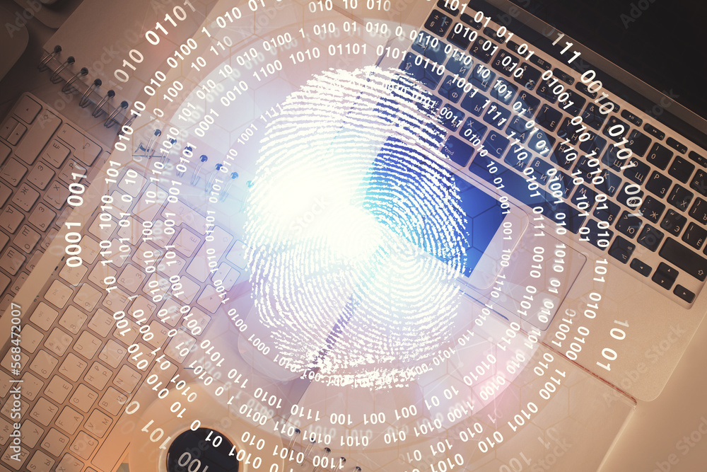 Poster Finger print over computer on the desktop background. Top view. Double exposure. Concept of securitization.
