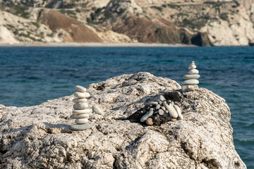 Stones pyramid on background of Mediterranean sea