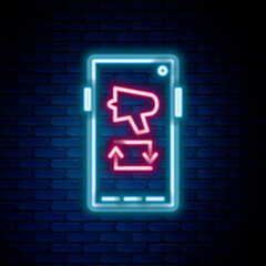 Glowing neon line Spread the word, megaphone on mobile phone icon isolated on brick wall background. Colorful outline concept. Vector