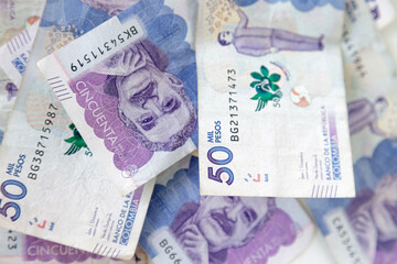 Macro closeup of 50 thousand Colombian pesos bills