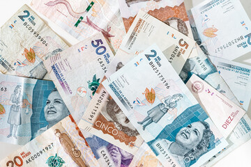 Macro closeup of Colombian pesos of different values