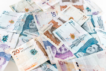 Macro closeup of Colombian pesos of different values