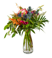 Isolated flower arrangement in a glass vase - 568479282