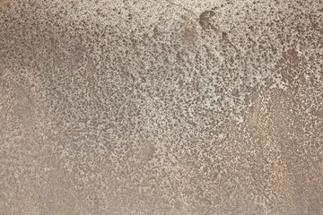 Closeup of old wall texture , vintage background with grungy plaster with faded color.