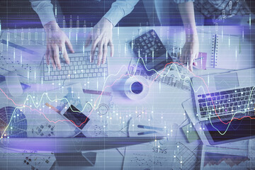 Double exposure of man and woman working together and financial chart hologram drawing. market analysis concept. Computer background. Top View.
