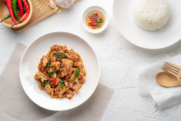 Stir Fried Canned Tuna with Thai Basil in white plate.asian spicy food.Top view