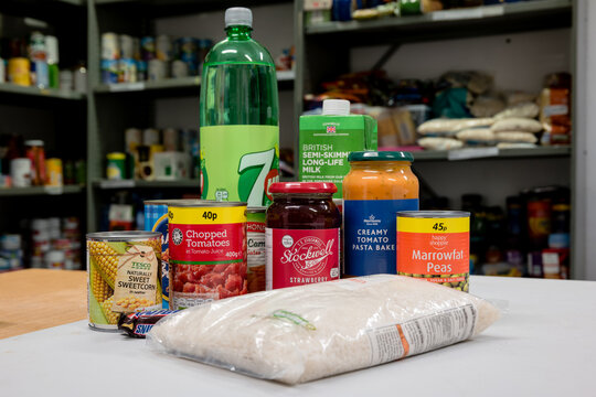 A selection of donated food and drink in a Trussell Trust local church food bank ready for food parcels