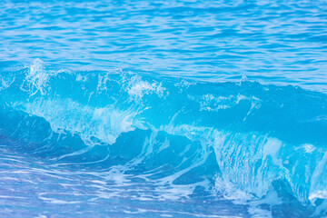 Nature background, start storm on blue sea wave on beach with splash