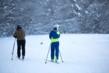 Woman cross country skiing on a sunny winter morning