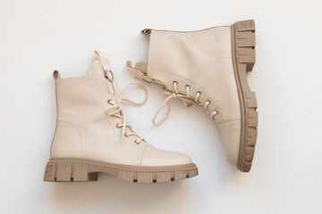 Beige Female Fashion Boots on White Background. Demi-season Female Fashion Shoes