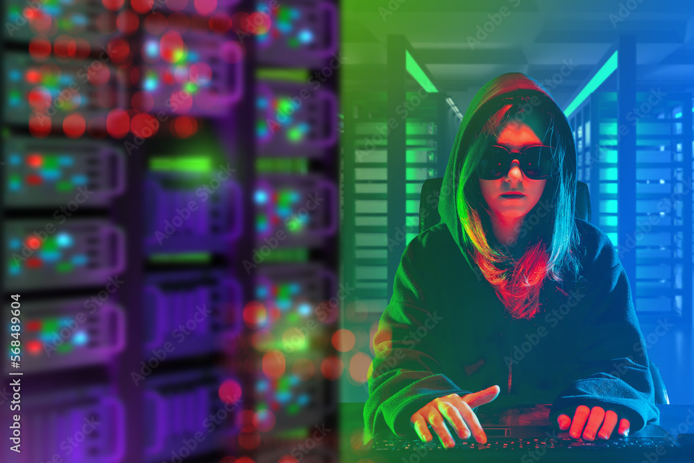 Poster woman hacker. girl is typing on keyboard. hooded woman is hacking servers. young lady is involved in