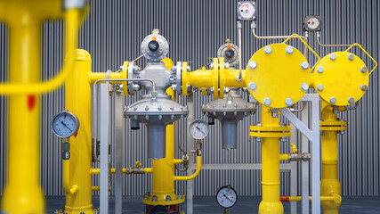 Gas equipment close-up. Compressor station with pressure gauges. Gas equipment inside factory building. Yellow pipes on metal supports. Supply of production with natural gas. 3d rendering. - obrazy, fototapety, plakaty