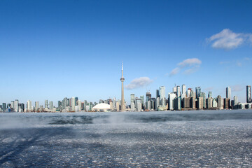 Wide angle view of Toronto skyline in winter from the Islands