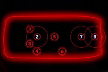 Digital black screen glows with red numbers