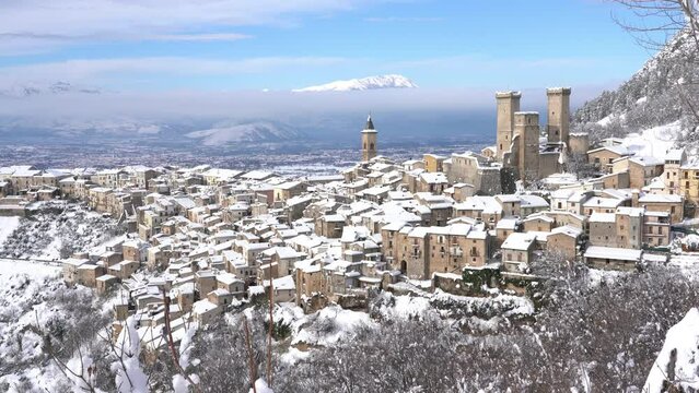 Panoramic view of Pacentro covered in snow during winter season. Abruzzo, Italy.