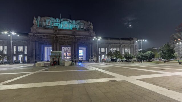 Panorama showing Milano Centrale night timelapse - the main central railway station of the city of Milan in Italy. Located on Piazza Duca d'Aosta near the long boulevard Via Vittor Pisani.