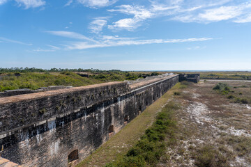 Fototapeta premium Gulf Islands National Seashore along Gulf of Mexico barrier islands of Florida. Fort Pickens pentagonal historic United States military fort on Santa Rosa Island. 