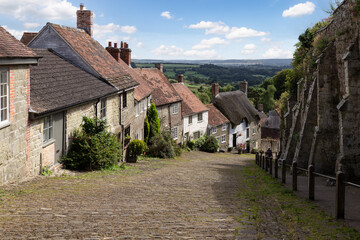 Fototapeta na wymiar Old English houses (Golden hill) in the picturesque village of Shaftesbury, Dorset, England.