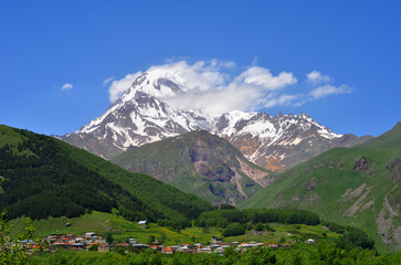 Fototapeta na wymiar Mountain village at the foot of Mount Kazbek.