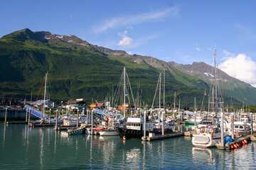 Fototapeta na wymiar The Valdez, Alaska, Harbor with Fishing Boats Dock at the Docks