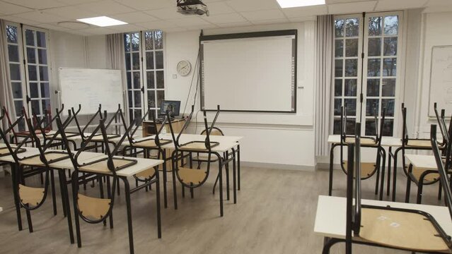 Enter in an empty classroom