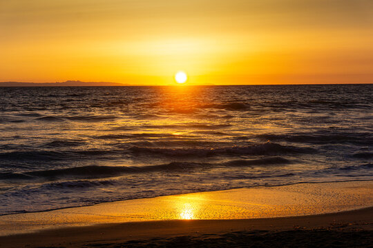 A beautiful glowing sunset in Laguna Beach, California.