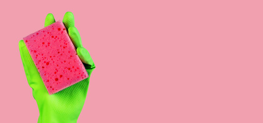 Pink sponge in hand in green glove on ad background, promotion banner design for professional cleaning service