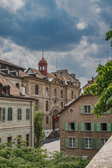 Old architecture on European street and cloudy weather 