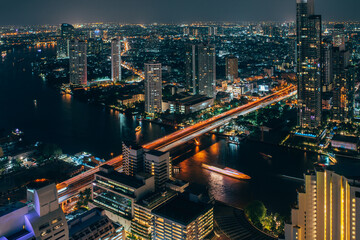 Fototapeta na wymiar night Bangkok in lights, transport and buildings