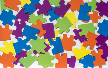 colored puzzle on wooden boards team business concept