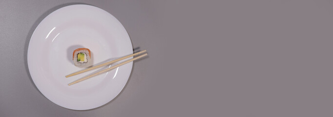 Sushi, roll with salmon and avocado on a white plate on a gray background, minimalism style, japanese cuisine concept. Horizontal banner - Powered by Adobe