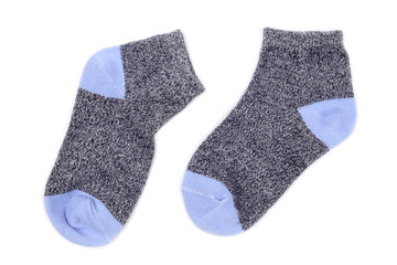 Pair of cute baby socks isolated on white