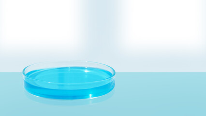 Petri dish with blue liquid on the background of an empty laboratory. Space for text.
