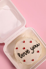 Trendy bento cake delicate biscuit with the inscription love you, a gift for mom or a loved one