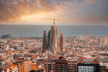 Beautiful aerial view of the Barcelona city with a Sagrada Familia cathedral standing in the city...