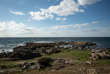 Fototapeta na wymiar Wide angle shot of a rocky coastline of the Balti Sea close to Allinge on Bornholm, Denmark