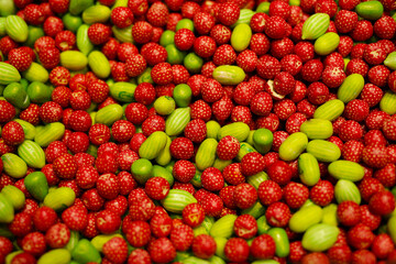 delicious, jelly, multi-colored sweets, lie on the table. a lot of colored, sweet candies, a background of many green, blue, yellow, pink, cyan, white, black, red candies of various shapes