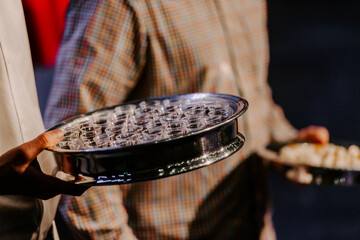 Communion with bread and wine during the service in the assembly