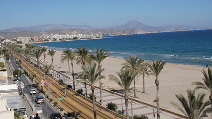 Playa de Muchavista en el Campello vista desde una terraza enfrente de la parada del TRAM en la parada de Popeye - obrazy, fototapety, plakaty