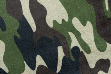 Moro patterned cotton fabric. A fragment of clothing textile in protective colors used in the military as camouflage - obrazy, fototapety, plakaty