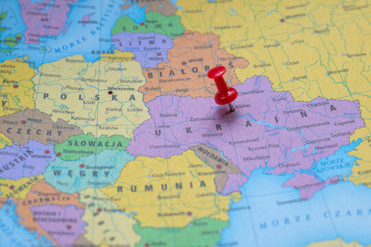 Map of Europe with red push pin showing the capital of Ukraine Kyiv city