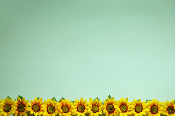 sunflower artificial flower background material picture in blue space