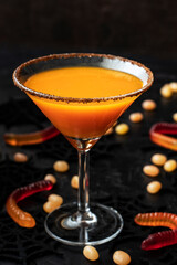 Pumpkin orange cocktail in glass. Fall Seasonal Drinks